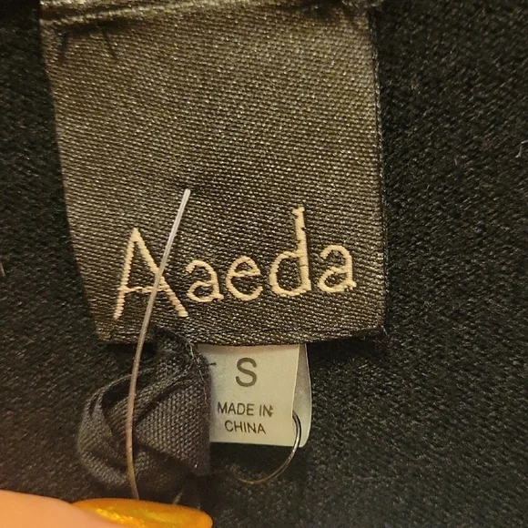 Black and White Cardigan with Floral Accents - Picture 2 of 5